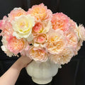 Avecutowa Rose bush with multi-colored blooms and upright stems
