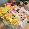 Avecutowa Rose bush with multi-colored blooms and upright stems